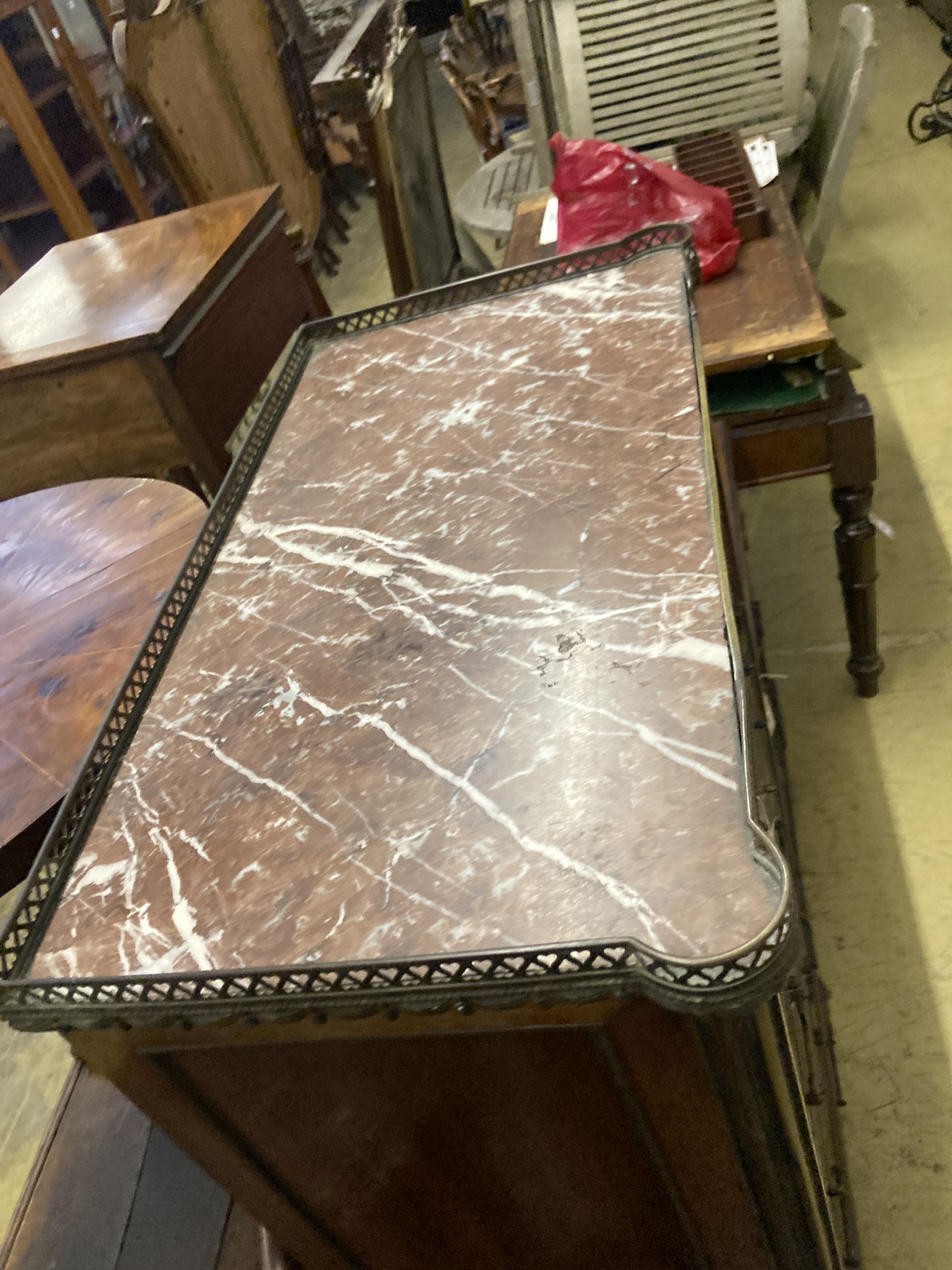 A late 19th century French marble topped mahogany semanier, width 74cm depth 38cm height 146cm